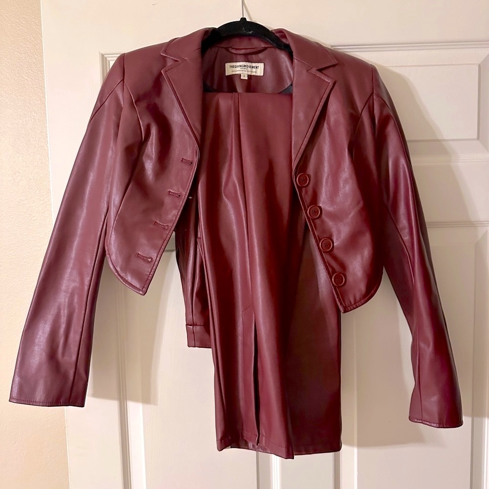 The giving movement dark red leather jacket and pants set.
